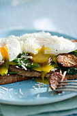 Poached eggs on toast with Spinach Sausage