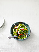 Colourful coconut salad with Asian dressing