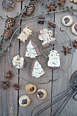 Chocolate sprinkle Christmas trees and a person, and a snowman biscuit