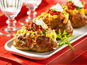 Twice baked potatoes stuffed with egg cheese and salsa