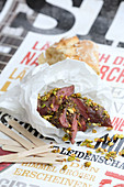 Grilled rack of lamb with pistachios