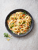 Linguine with salmon, peas, dill, lemon zest and a creamy sauce