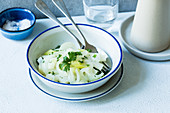 A steamed kohlrabi and onion medley
