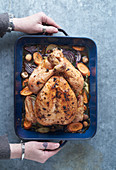 Roast chicken in a roasting pan