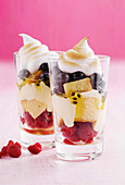 Berry trifle with passion fruit and meringues