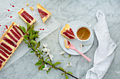 Semolina tart with rhubarb and a cup of coffee