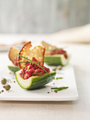 Cucumber boats with tartar and farmhouse bread crisps