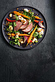 Pomegranate-glazed lamb and lentil salad