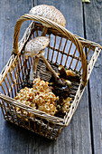 A basket of various freshly harvested mushrooms