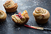 Vegan yeast dough cruffins with a raspberry fruit spread