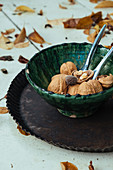Walnuts with autumn leaves