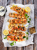 Grilled salmon skewers with oregano and tzatziki
