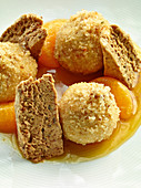 Sponge and speculoos biscuits with glazed mandarins