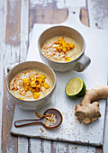 A white winter bowl made with white cabbage, coconut and dates with amaranth
