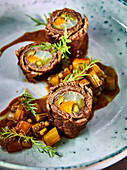 Stuffed beef roulades with spelt and vegetables