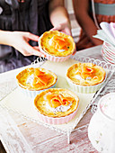 Smoked salmon and pea quiches with herb creme fraiche