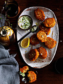 Red lentils fritter with green yoghurt