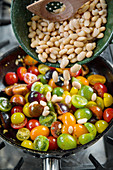Colourful tomato medley with white beans
