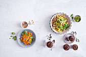 Vegetarian low carb menu with carrot salad, kohlrabi noodles and chocolate mousse