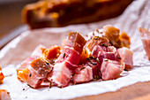 Strips of smoked bacon with caraway (close-up)