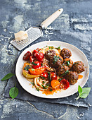 Lamb meatballs with linguine and caramelised tomatoes