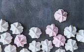 Pink and white meringue bites