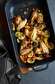 Oven-roasted vegetables with chicken wings
