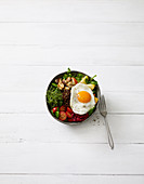 Sunny side up bowl with lentils and a fried egg