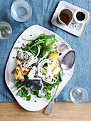Daikon salad with honey, goat's cheese and pears