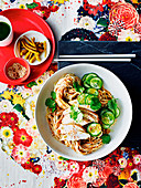Egg noodles with Sichuan pepper chicken and cucumber