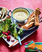Two-cheese fondue with prosciutto toast and crudite