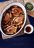 Pot-roasted spatchcock with saffron, olive and quince