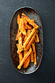 Roasted sweet potato strips with a curry crust