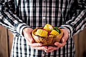 Man with corn (Mexican food)