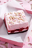 Raspberry slices with white chocolate pearls