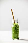 Healthy green smoothie on a table