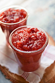 Apple and cranberry sauce in glasses