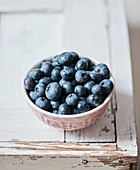 Fresh blueberries in a ceramic bowl