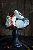 Various goat's cheeses on a cake stand