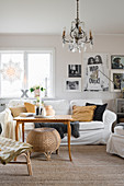 Sofa and coffee table in living room in natural shades