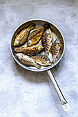 Fried fish in a pan