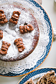 Easter cake with chocolate, on a blue plate with chocolate bunnies