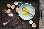 Eggs and eggs shells on a baking tray