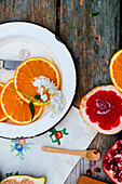 A plate with oranges, grape fruit