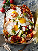 Chilaquiles with fried egg (Mexico)