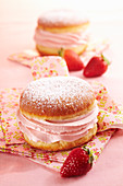 A carnival doughnut filled with strawberry cream