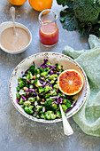 Broccoli and red cabbage salad with almond and orange dressing