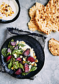 Roasted beetroot salad with yogurt dressing, dill, spinage and toasted almonds