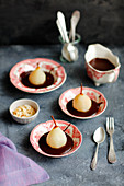 Cooked spicy pears with vegan chocolate pudding