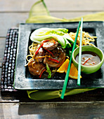 Five spice duck with pak choi, chillies, noodles and oranges (China)